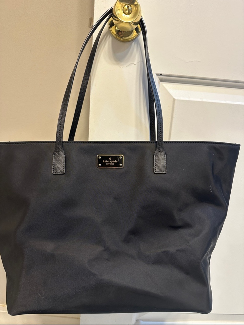 kate spade black nylon tote with gold logo plaque